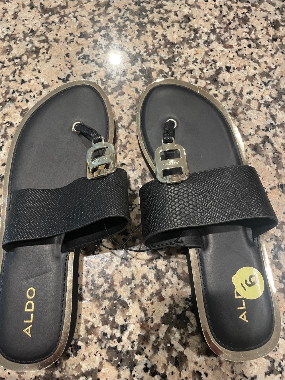 Aldo Black Slip-On Sandals with Gold Accent